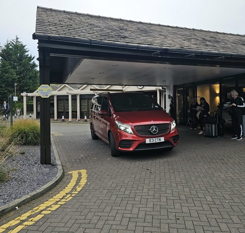 Red Mercedes Benz UK, Safe Travels VIP Chauffeur Services Picking Up Customers