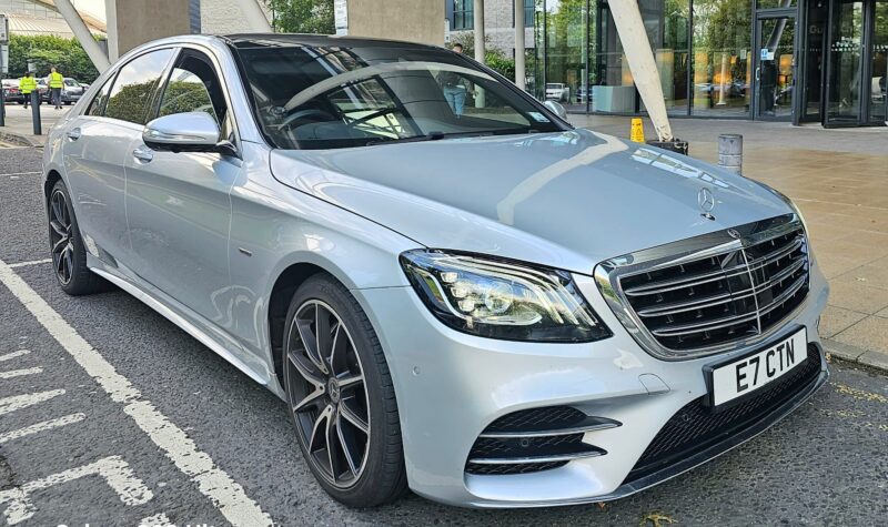 Safe Travels VIP Fleet Parked Outside UK Business Entrance